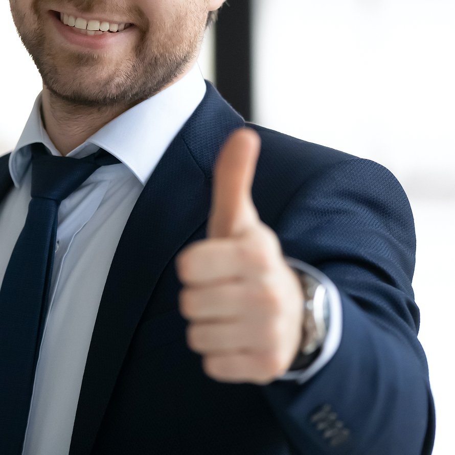 Close Up Of Businessman Show Thumb Up To Good Service